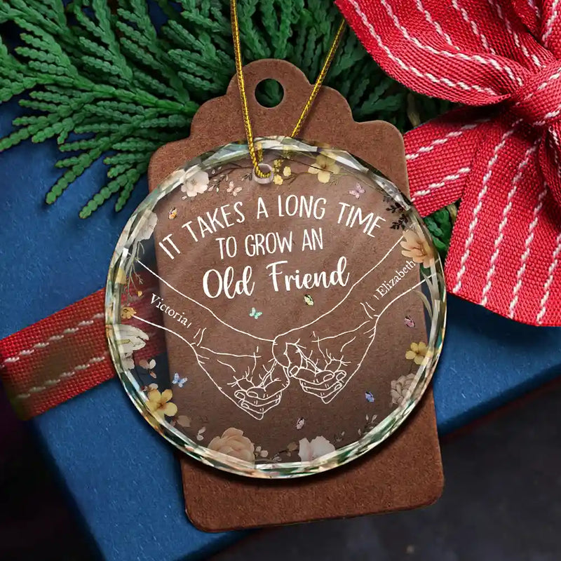 Gift For Bestie, Gift For Sisters - Holding Hands It Takes A Long Time To Grow An Old Friend - Personalized Circle Glass Ornament