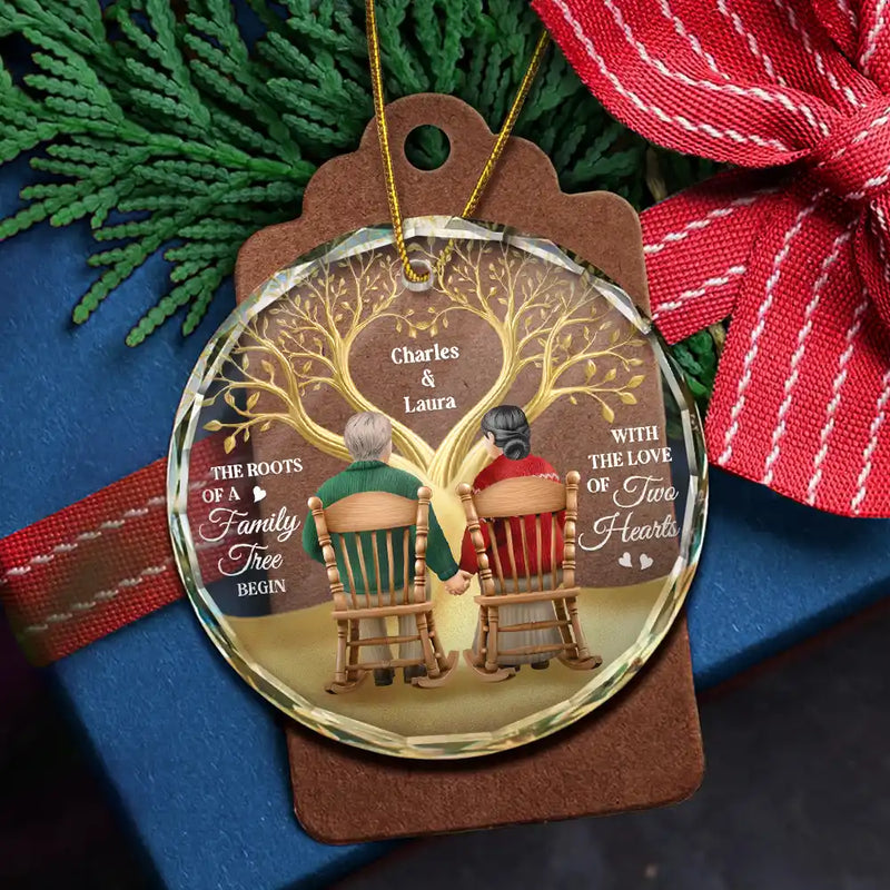 Gift For Couples,Old Couples,Gift For Wife,Gift For Husband,Christmas,Love,Gift For Women,Gift For Men - The Roots Of A Family Tree Begin With Two Hearts - Personalized Circle Glass Ornament
