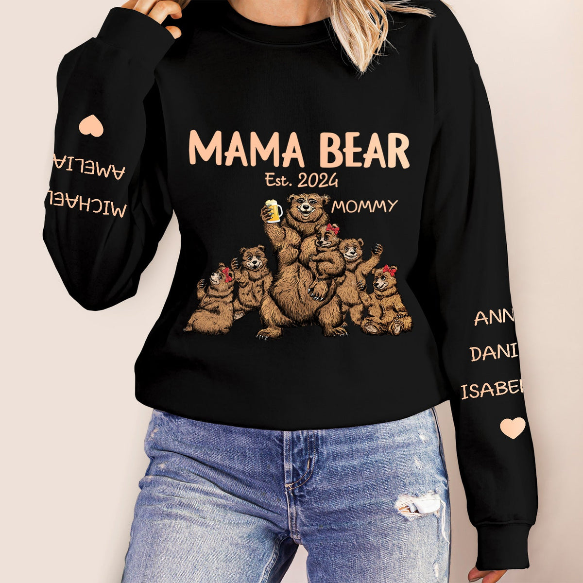 This Mama Bear Wears Her Heart - Gift For Mom, Nana - Personalized Unisex Sweatshirt With Design On Sleeve